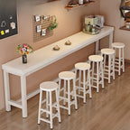 Table de bar industrielle en bois brun avec repose-pieds pour pub à domicile