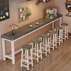 Table de bar industrielle en bois brun avec repose-pieds pour pub à domicile