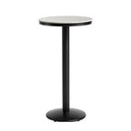 Table de bar ronde en pierre gris industriel, hauteur 2 places