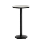 Table de bar ronde en pierre gris industriel, hauteur 2 places