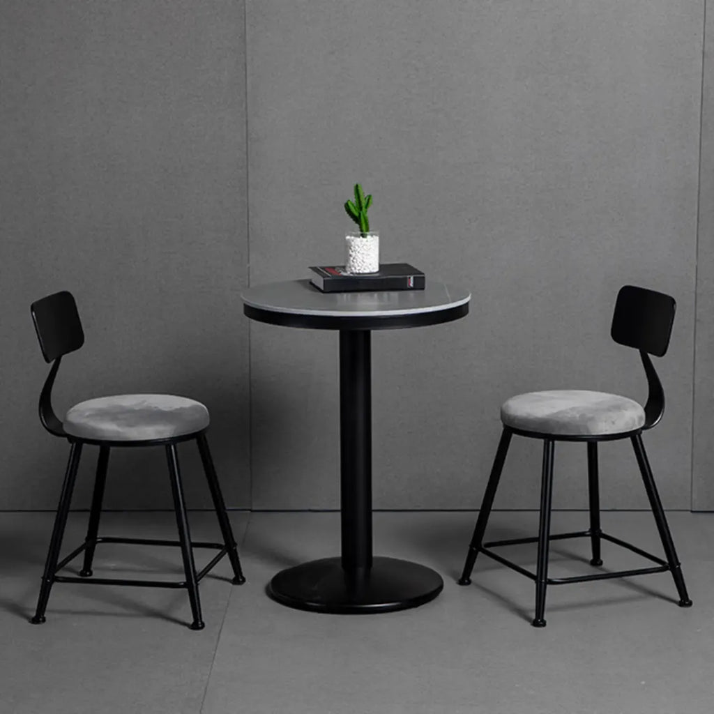 Table de bar ronde en pierre gris industriel, hauteur 2 places