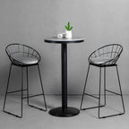 Table de bar ronde en pierre gris industriel, hauteur 2 places