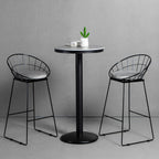 Table de bar ronde en pierre gris industriel, hauteur 2 places