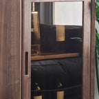 Vitrine autoportante en bois brun avec porte vitrée
