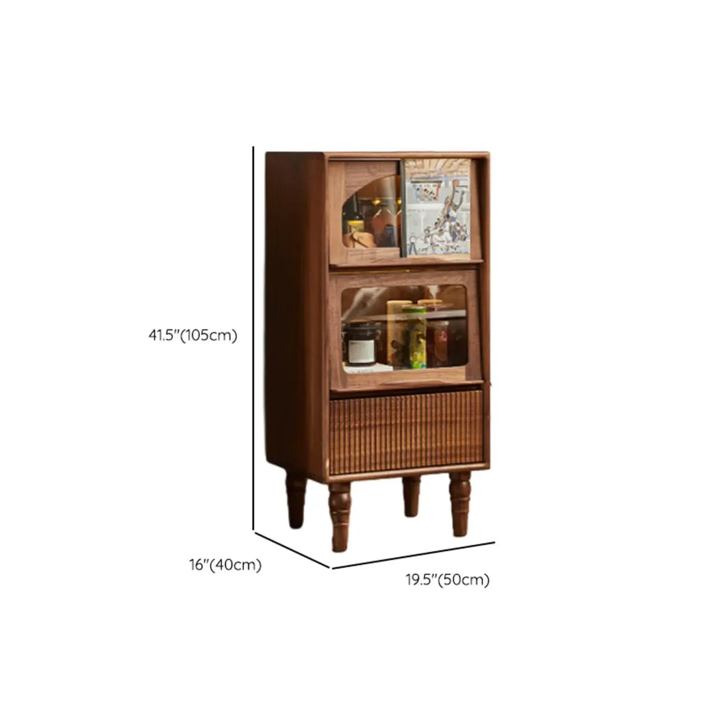 Vitrine autoportante en bois brun avec porte vitrée