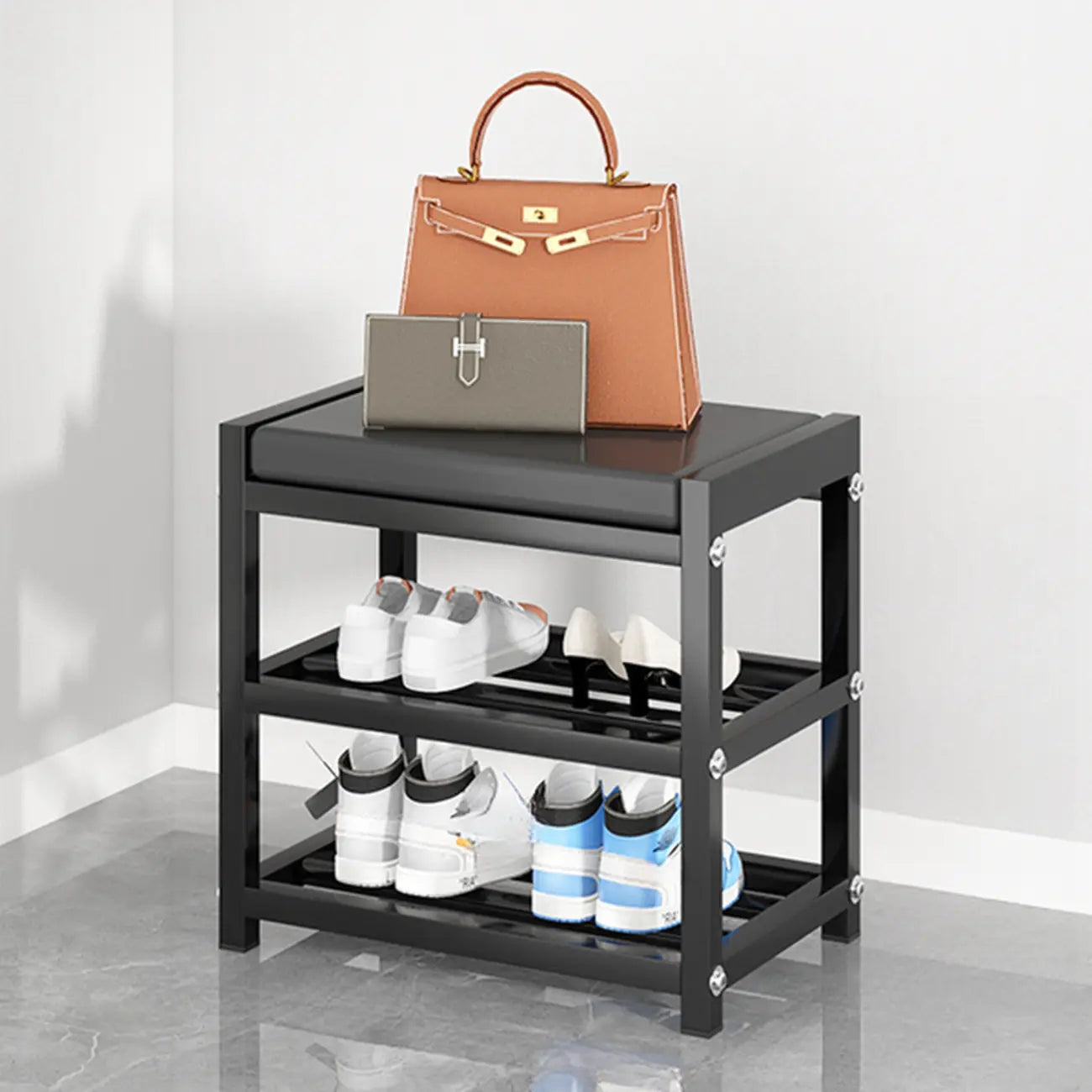 Banc d'entrée en métal noir avec rangement à chaussures et coussin