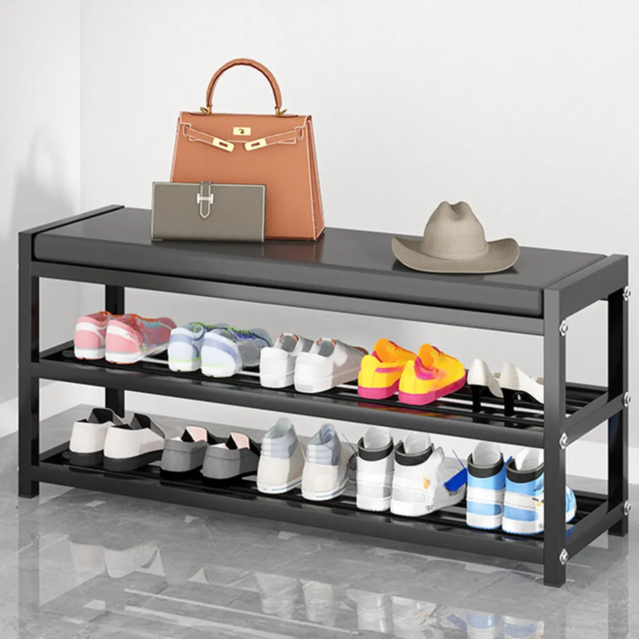 Banc d'entrée en métal noir avec rangement à chaussures et coussin