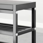 Banc d'entrée en métal noir avec rangement à chaussures et coussin