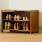 Meuble à chaussures bohème en bois brun avec portes en rotin