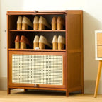 Meuble à chaussures bohème en bois brun avec portes en rotin