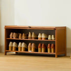 Meuble à chaussures bohème en bois brun avec portes en rotin