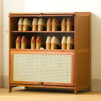 Meuble à chaussures bohème en bois brun avec portes en rotin