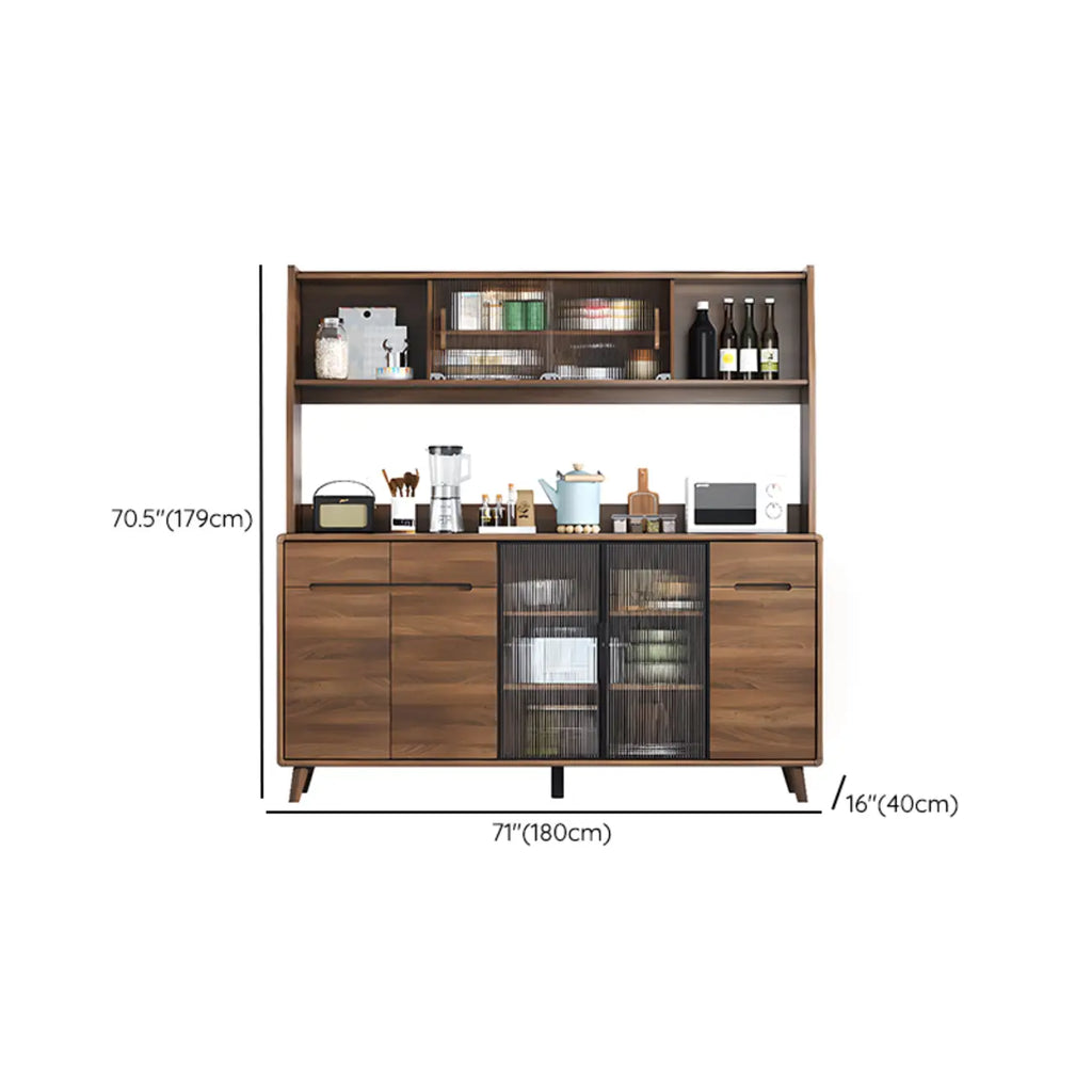 Buffet de cuisine en bois brun avec panneau perforé