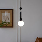 Suspension minimaliste en bois et verre noir avec globe lumineux