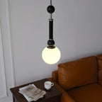 Suspension minimaliste en bois et verre noir avec globe lumineux