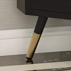 Élégant meuble d'angle en verre avec plateau en faux marbre blanc et noir.