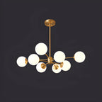Lustre Sputnik doré moderne avec globe en verre blanc
