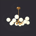 Lustre Sputnik doré moderne avec globe en verre blanc
