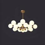 Lustre Sputnik doré moderne avec globe en verre blanc