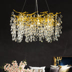 Lustre élégant en cristal, style moderne, à branches dorées et branches.