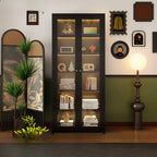 Bibliothèque contemporaine en métal noir avec portes vitrées