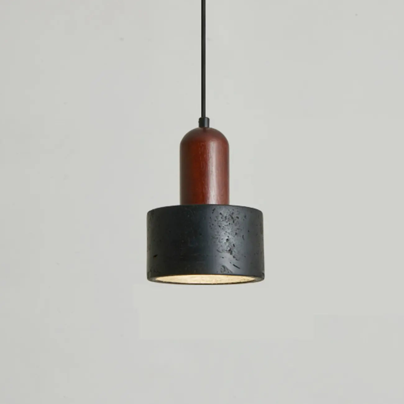 Suspension cylindrique en bois et pierre noire pour chambre