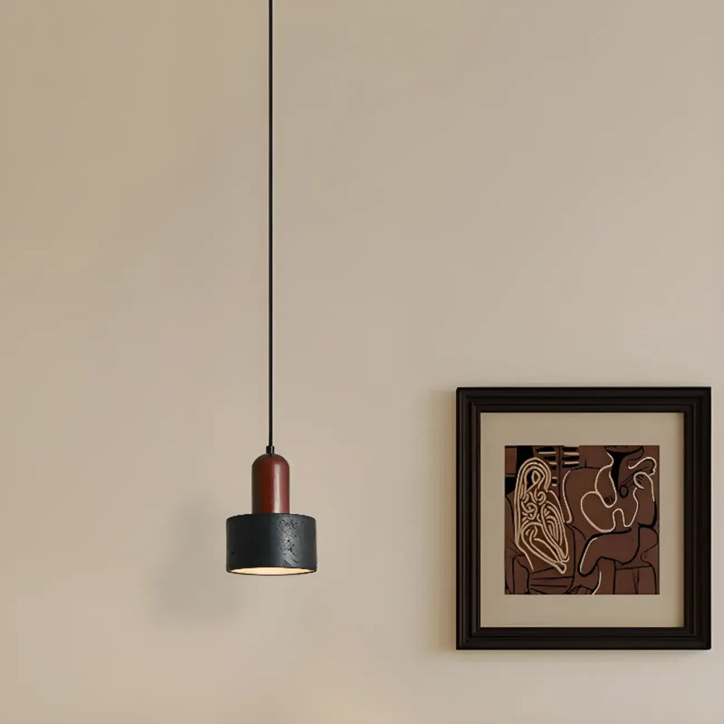 Suspension cylindrique en bois et pierre noire pour chambre
