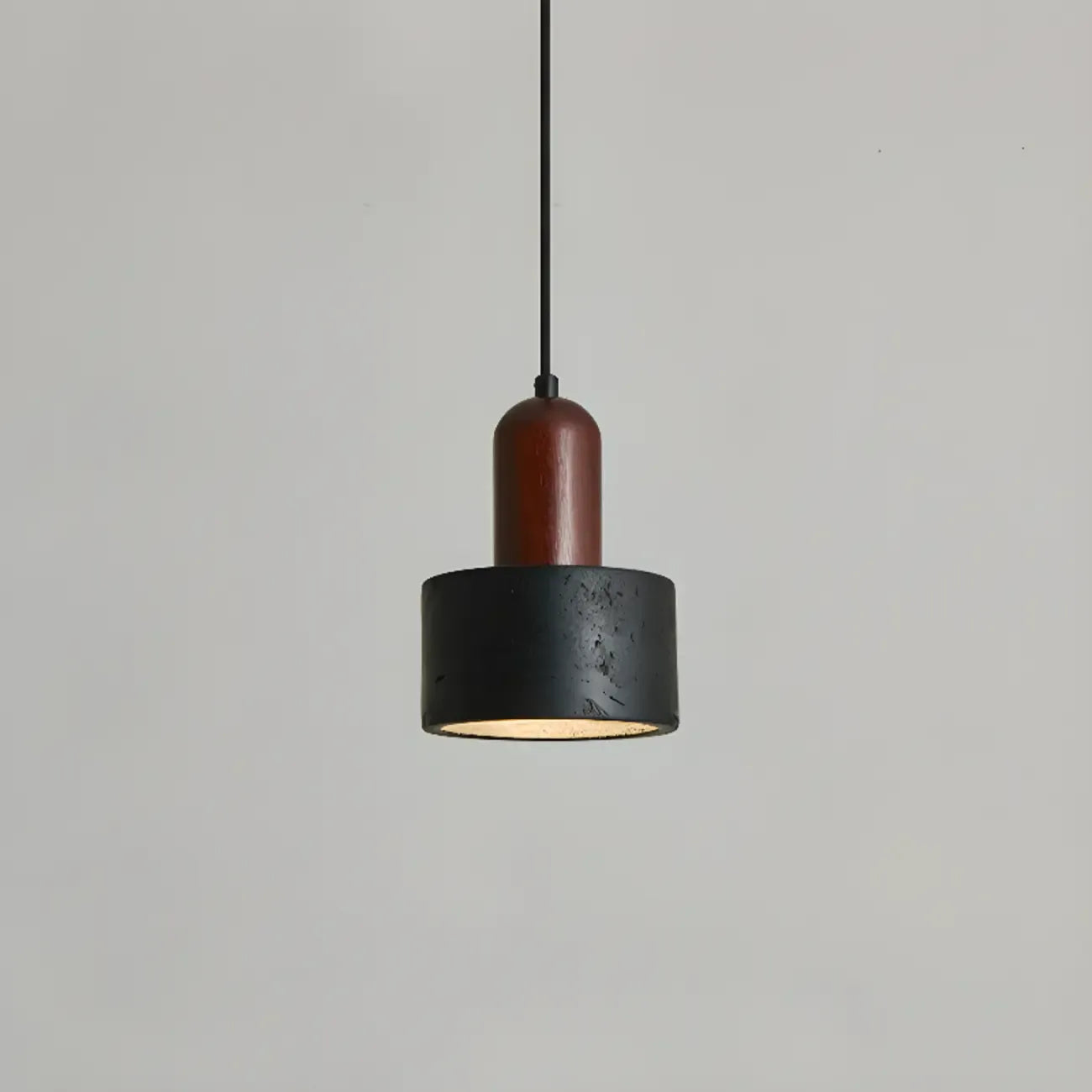 Suspension cylindrique en bois et pierre noire pour chambre
