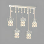 Suspension élégante cylindrique en cristal pour îlot de cuisine avec projecteur