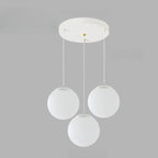 Suspension de cuisine minimaliste en verre blanc et métal argenté, globe