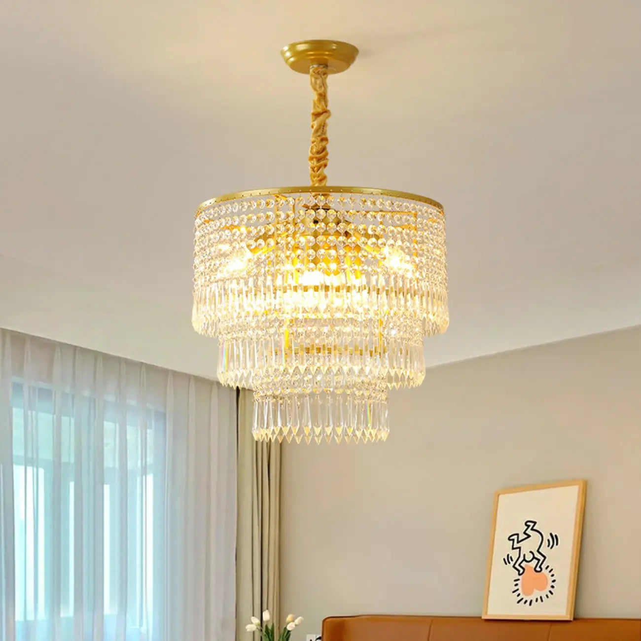 Lustre rond moderne en cristal doré à suspension descendante
