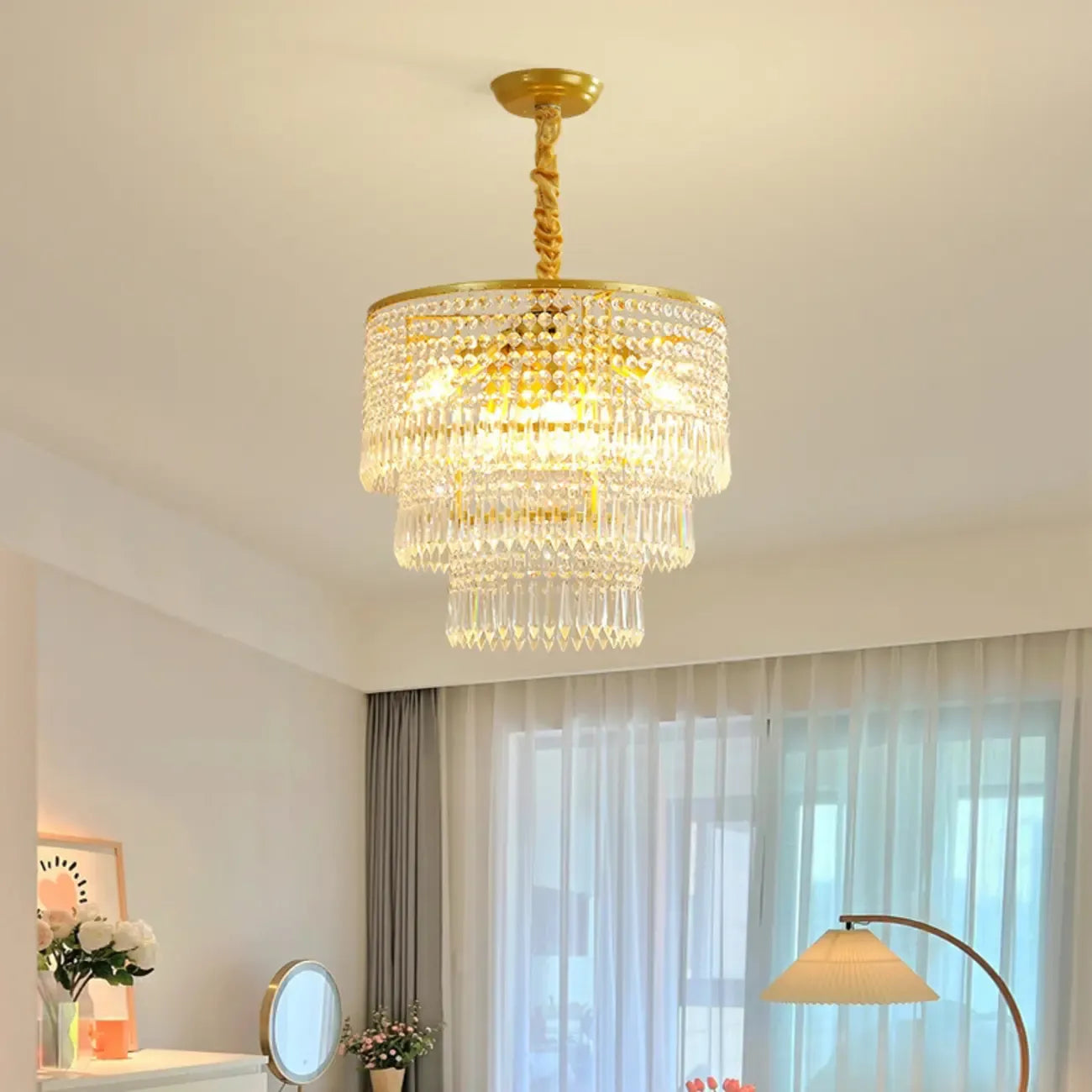 Lustre rond moderne en cristal doré à suspension descendante
