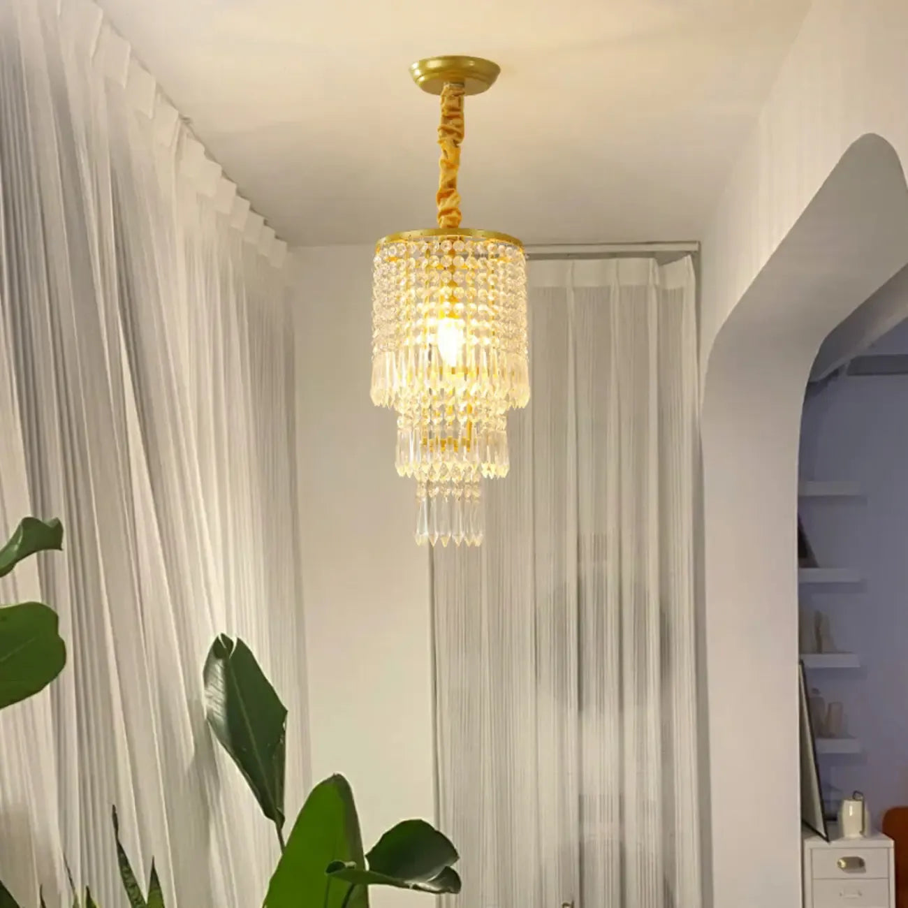 Lustre rond moderne en cristal doré à suspension descendante