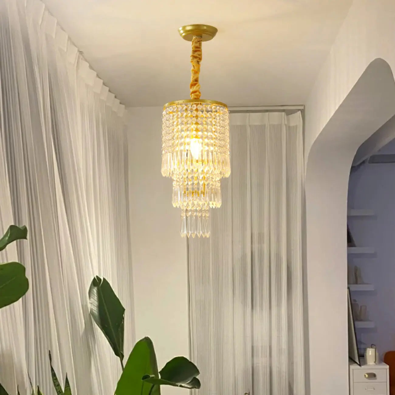 Lustre rond moderne en cristal doré à suspension descendante