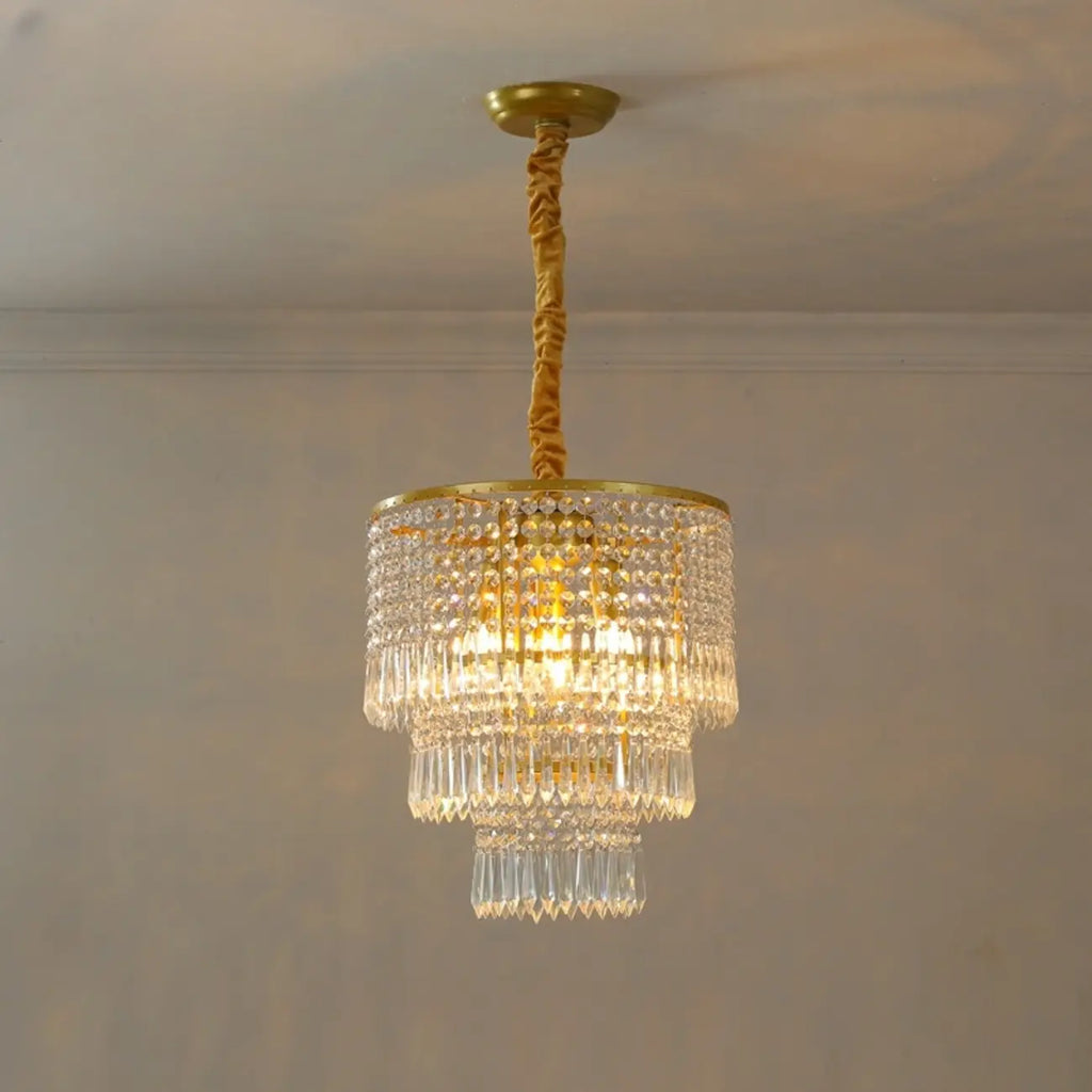 Lustre rond moderne en cristal doré à suspension descendante