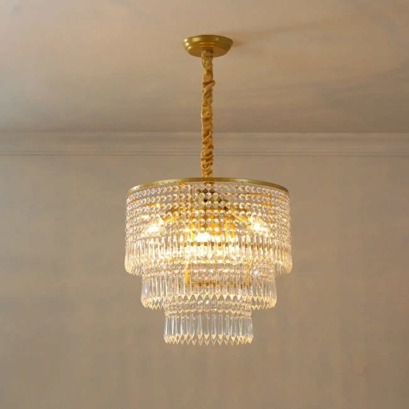 Lustre rond moderne en cristal doré à suspension descendante