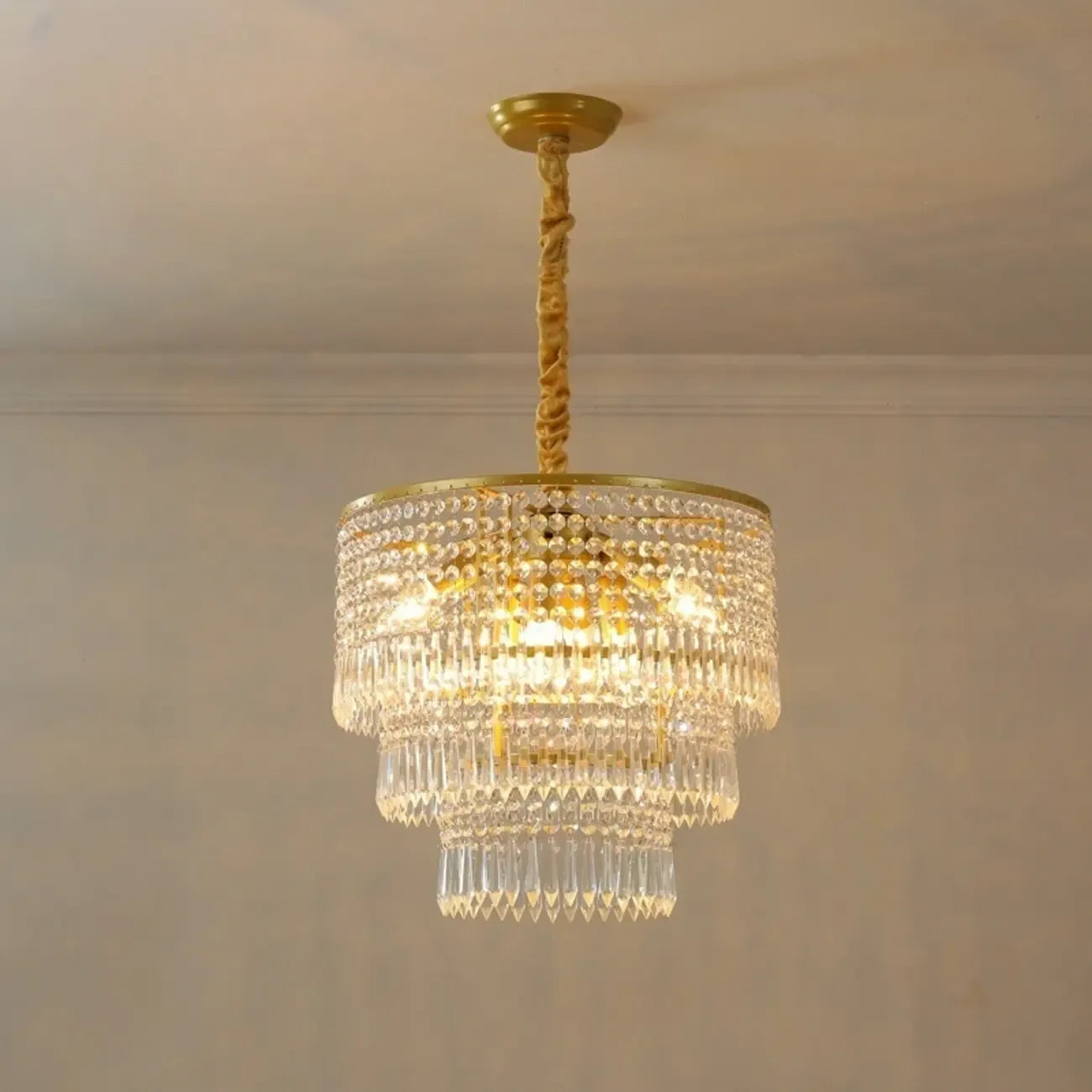 Lustre rond moderne en cristal doré à suspension descendante