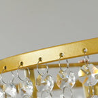 Lustre rond moderne en cristal doré à suspension descendante