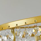 Lustre rond moderne en cristal doré à suspension descendante