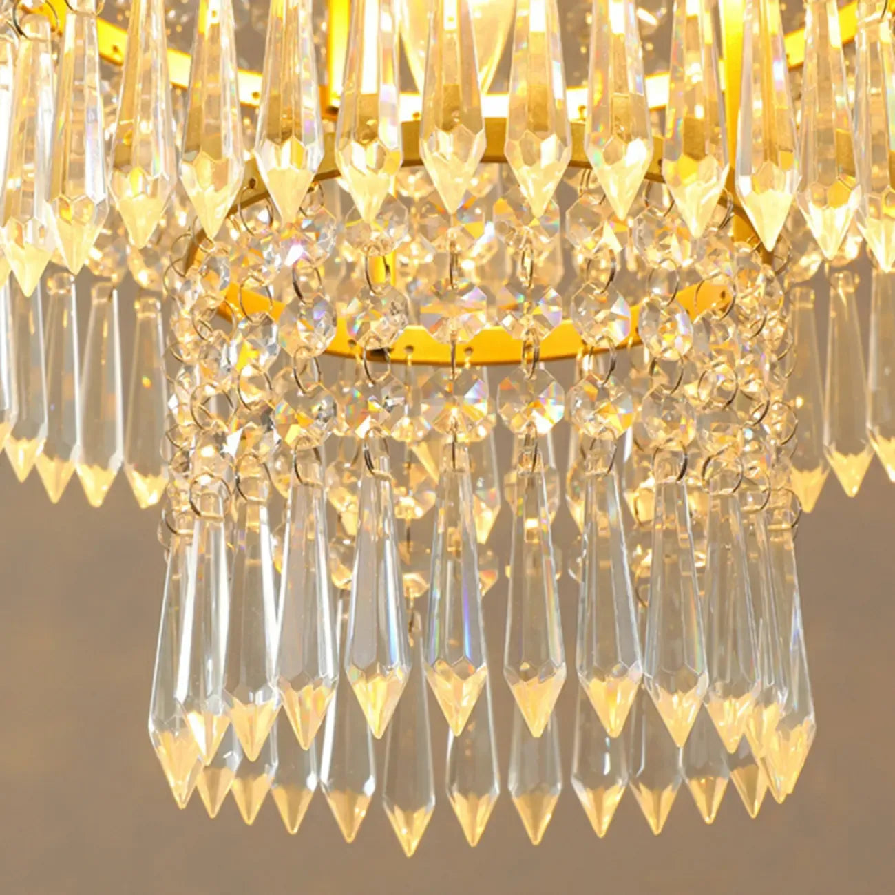 Lustre rond moderne en cristal doré à suspension descendante