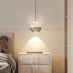 Suspension moderne en métal transparent avec globe lumineux réglable pour chambre à coucher