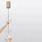 Suspension moderne en métal transparent avec globe lumineux réglable pour chambre à coucher