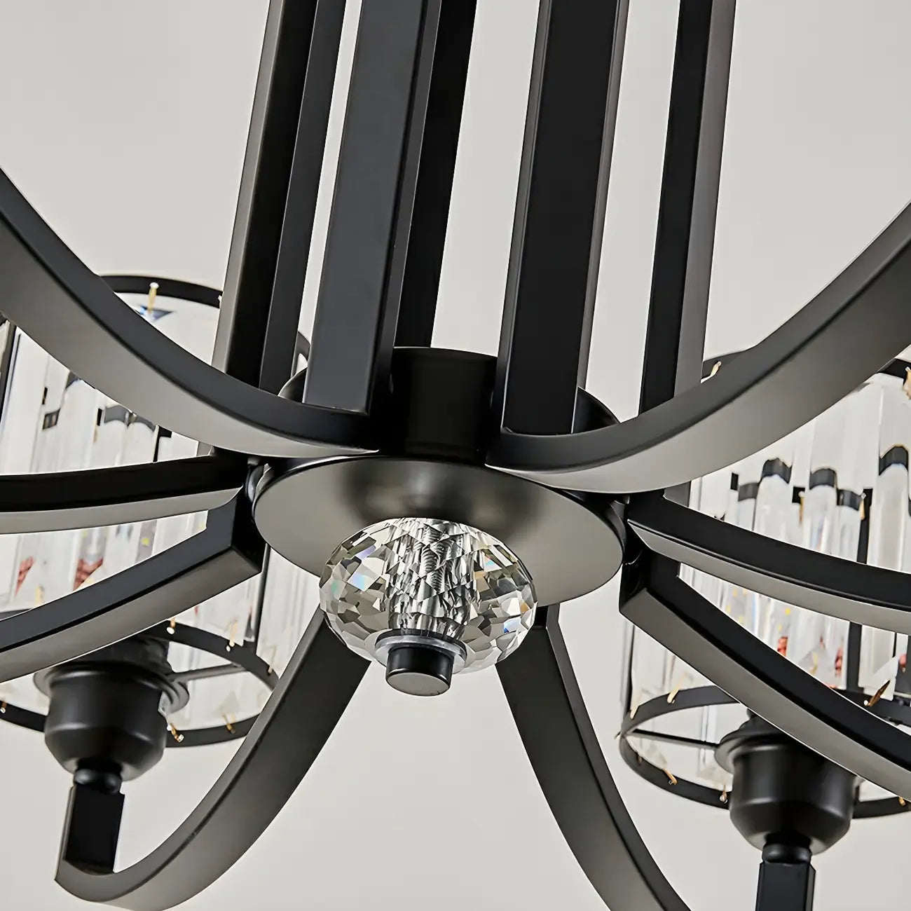 Lustre moderne en forme de cylindre de roue en métal noir et cristal pour salon ou hall d'entrée