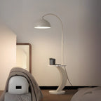Lampadaire LED géométrique ivoire en forme d'arc avec étagère de rangement pour intérieur