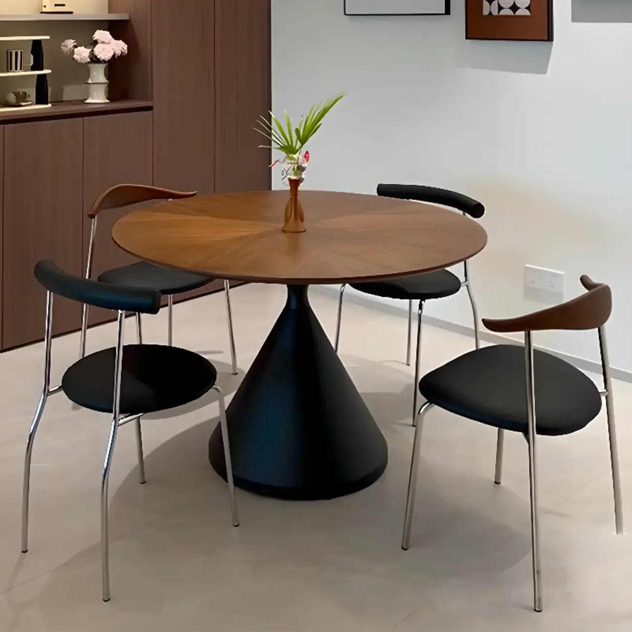 Table de salle à manger moderne ronde en bois brun avec piètement conique en métal
