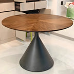 Table de salle à manger moderne ronde en bois brun avec piètement conique en métal