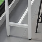 Tables de bar modernes avec plateau en pierre gris tourterelle et repose-pieds en acier