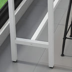 Tables de bar modernes avec plateau en pierre gris tourterelle et repose-pieds en acier