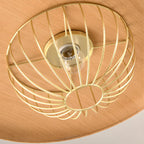 Suspension ronde dorée élégante pour intérieur