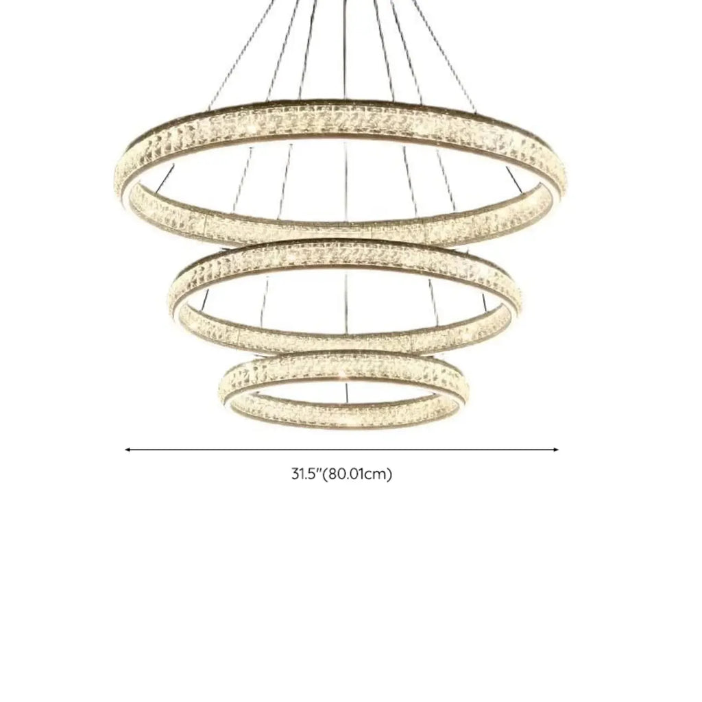 Lustre de luxe à anneaux dorés étagés en cristal et LED